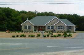 Now we've placed the shrubs and prepped for grass...